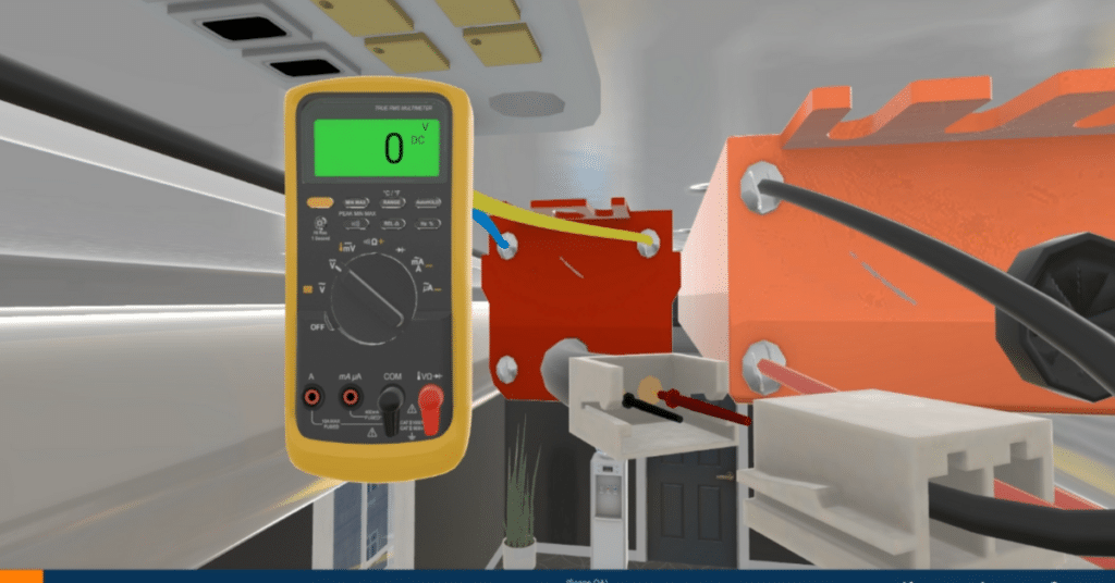 a yellow and black multimeter sitting on top of a table